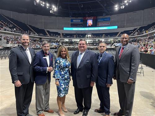 Board of education members on floor before James CLemens graduation
